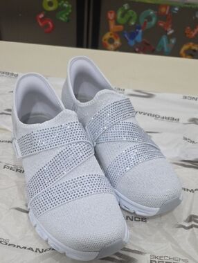 Skechers Women’s White Slip-On Athletic Sneakers with Crystal Straps